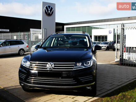 Черный Фольксваген Туарег, объемом двигателя 3 л и пробегом 106 тыс. км за 32519 $, фото 1 на Automoto.ua