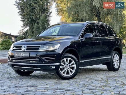 Черный Фольксваген Туарег, объемом двигателя 2.97 л и пробегом 275 тыс. км за 24800 $, фото 1 на Automoto.ua