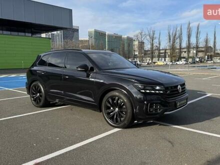 Черный Фольксваген Туарег, объемом двигателя 2.97 л и пробегом 246 тыс. км за 49500 $, фото 1 на Automoto.ua