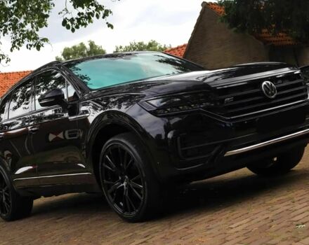 Черный Фольксваген Туарег, объемом двигателя 3 л и пробегом 33 тыс. км за 22000 $, фото 1 на Automoto.ua