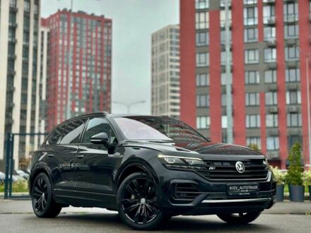 Черный Фольксваген Туарег, объемом двигателя 3 л и пробегом 141 тыс. км за 48500 $, фото 1 на Automoto.ua