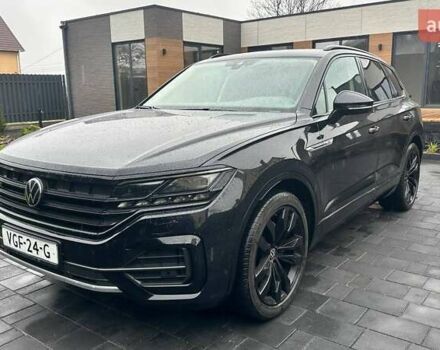 Чорний Фольксваген Туарег, об'ємом двигуна 3 л та пробігом 145 тис. км за 49990 $, фото 1 на Automoto.ua