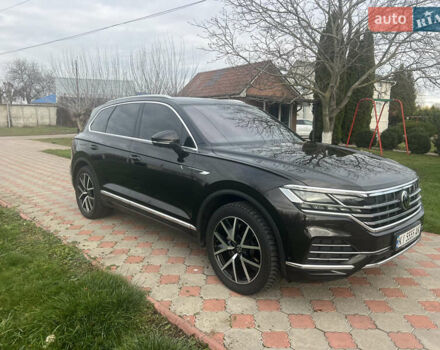 Черный Фольксваген Туарег, объемом двигателя 3 л и пробегом 142 тыс. км за 53700 $, фото 1 на Automoto.ua