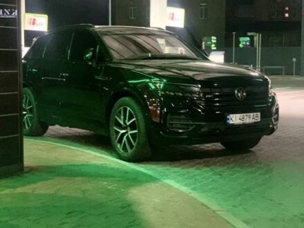 Черный Фольксваген Туарег, объемом двигателя 3 л и пробегом 240 тыс. км за 50000 $, фото 1 на Automoto.ua