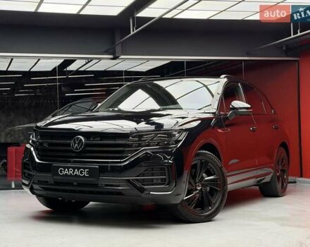 Чорний Фольксваген Туарег, об'ємом двигуна 3 л та пробігом 154 тис. км за 56900 $, фото 1 на Automoto.ua