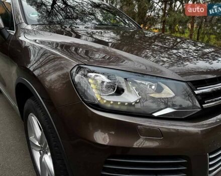Коричневий Фольксваген Туарег, об'ємом двигуна 3 л та пробігом 296 тис. км за 19390 $, фото 2 на Automoto.ua