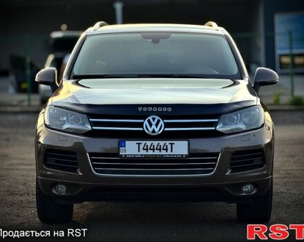 Коричневый Фольксваген Туарег, объемом двигателя 3 л и пробегом 236 тыс. км за 18000 $, фото 1 на Automoto.ua