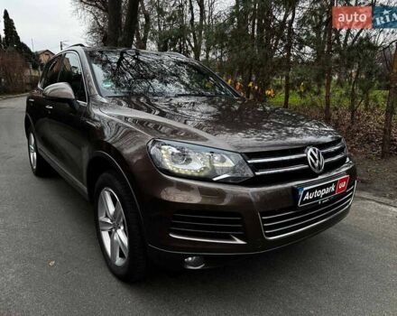 Коричневий Фольксваген Туарег, об'ємом двигуна 3 л та пробігом 296 тис. км за 19390 $, фото 3 на Automoto.ua