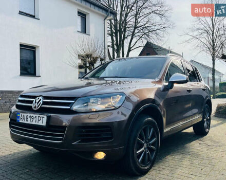 Коричневый Фольксваген Туарег, объемом двигателя 3 л и пробегом 175 тыс. км за 19000 $, фото 1 на Automoto.ua