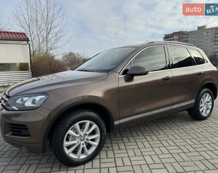 Коричневый Фольксваген Туарег, объемом двигателя 3 л и пробегом 191 тыс. км за 18000 $, фото 1 на Automoto.ua