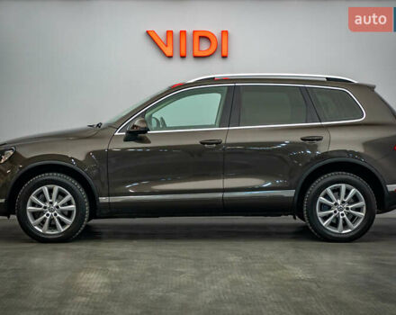 Коричневый Фольксваген Туарег, объемом двигателя 3 л и пробегом 100 тыс. км за 22796 $, фото 2 на Automoto.ua