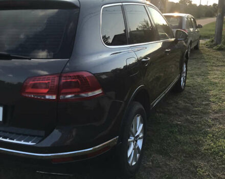 Коричневий Фольксваген Туарег, об'ємом двигуна 3 л та пробігом 255 тис. км за 29400 $, фото 1 на Automoto.ua