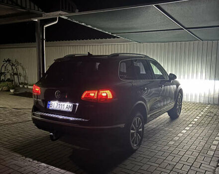 Коричневий Фольксваген Туарег, об'ємом двигуна 3 л та пробігом 154 тис. км за 33300 $, фото 2 на Automoto.ua