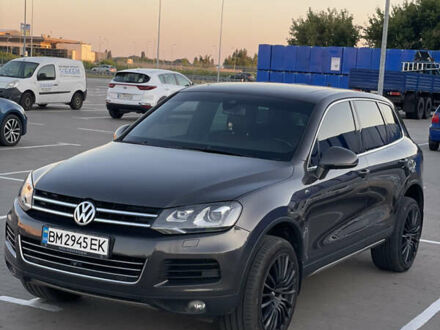 Коричневый Фольксваген Туарег, объемом двигателя 4.2 л и пробегом 313 тыс. км за 21000 $, фото 1 на Automoto.ua