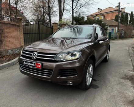 Коричневий Фольксваген Туарег, об'ємом двигуна 3 л та пробігом 296 тис. км за 19390 $, фото 1 на Automoto.ua