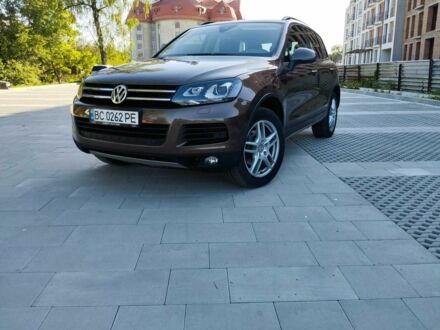 Коричневый Фольксваген Туарег, объемом двигателя 3 л и пробегом 235 тыс. км за 20998 $, фото 1 на Automoto.ua