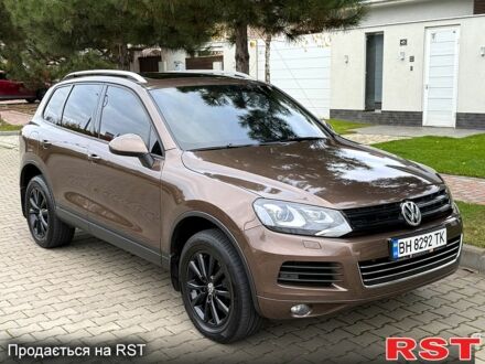 Коричневый Фольксваген Туарег, объемом двигателя 3 л и пробегом 200 тыс. км за 17500 $, фото 1 на Automoto.ua