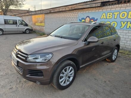 Коричневий Фольксваген Туарег, об'ємом двигуна 3 л та пробігом 265 тис. км за 20000 $, фото 1 на Automoto.ua