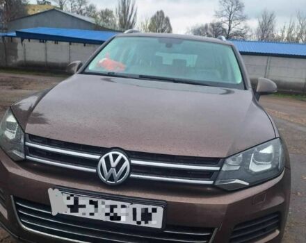 Коричневий Фольксваген Туарег, об'ємом двигуна 3 л та пробігом 340 тис. км за 11666 $, фото 1 на Automoto.ua