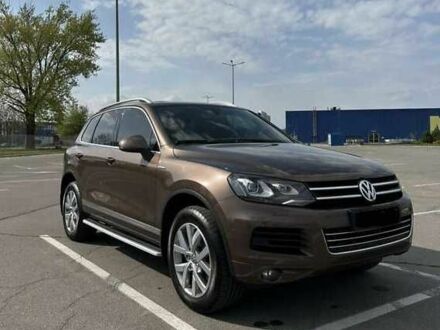 Коричневый Фольксваген Туарег, объемом двигателя 3 л и пробегом 80 тыс. км за 17500 $, фото 1 на Automoto.ua