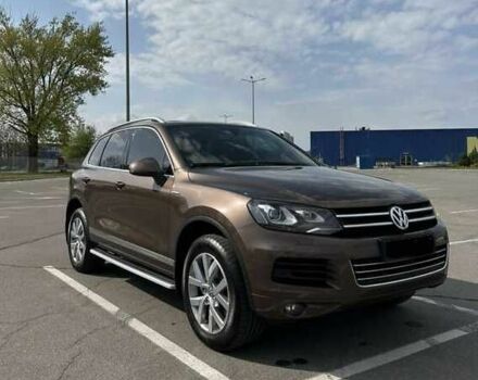 Коричневый Фольксваген Туарег, объемом двигателя 3 л и пробегом 80 тыс. км за 17500 $, фото 1 на Automoto.ua