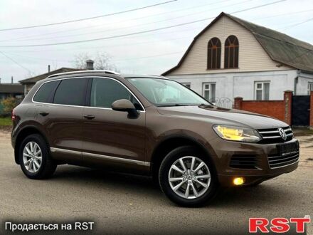 Коричневий Фольксваген Туарег, об'ємом двигуна 3 л та пробігом 190 тис. км за 15980 $, фото 1 на Automoto.ua