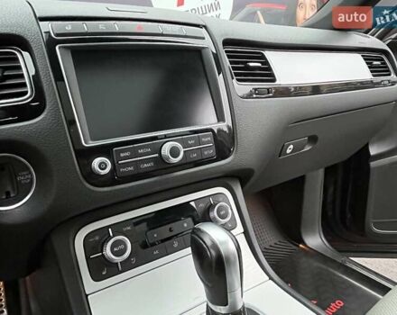 Красный Фольксваген Туарег, объемом двигателя 3.6 л и пробегом 189 тыс. км за 22649 $, фото 34 на Automoto.ua