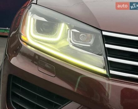 Красный Фольксваген Туарег, объемом двигателя 3.6 л и пробегом 189 тыс. км за 22649 $, фото 5 на Automoto.ua