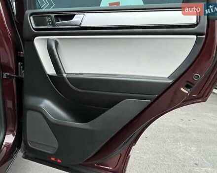 Красный Фольксваген Туарег, объемом двигателя 3.6 л и пробегом 189 тыс. км за 22649 $, фото 21 на Automoto.ua