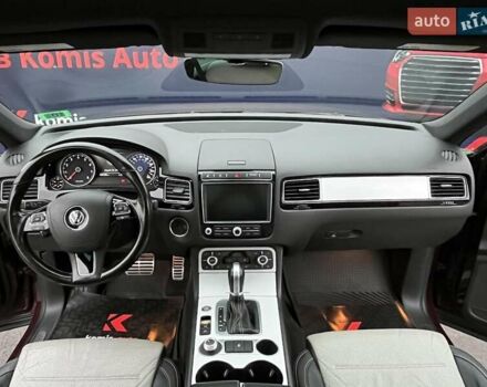 Красный Фольксваген Туарег, объемом двигателя 3.6 л и пробегом 189 тыс. км за 22649 $, фото 1 на Automoto.ua