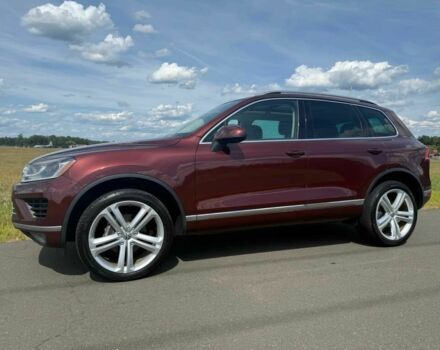 Красный Фольксваген Туарег, объемом двигателя 3.6 л и пробегом 51 тыс. км за 6200 $, фото 2 на Automoto.ua