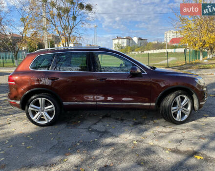 Красный Фольксваген Туарег, объемом двигателя 3.6 л и пробегом 127 тыс. км за 21500 $, фото 3 на Automoto.ua