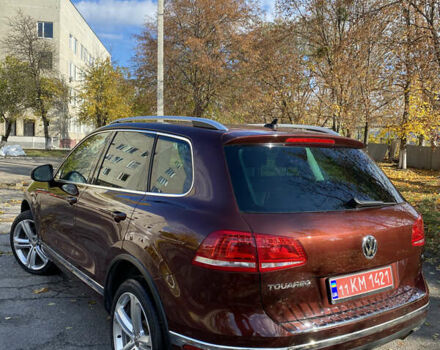 Красный Фольксваген Туарег, объемом двигателя 3.6 л и пробегом 127 тыс. км за 21500 $, фото 9 на Automoto.ua