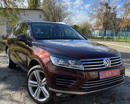 Красный Фольксваген Туарег, объемом двигателя 3.6 л и пробегом 127 тыс. км за 21500 $, фото 1 на Automoto.ua