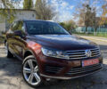 Красный Фольксваген Туарег, объемом двигателя 3.6 л и пробегом 127 тыс. км за 21500 $, фото 1 на Automoto.ua