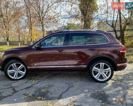Красный Фольксваген Туарег, объемом двигателя 3.6 л и пробегом 127 тыс. км за 21500 $, фото 4 на Automoto.ua