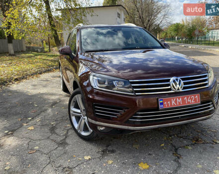 Красный Фольксваген Туарег, объемом двигателя 3.6 л и пробегом 127 тыс. км за 21500 $, фото 2 на Automoto.ua