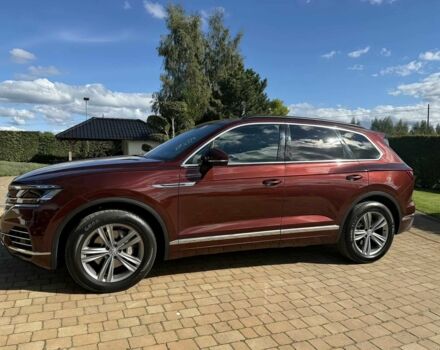 Красный Фольксваген Туарег, объемом двигателя 3 л и пробегом 40 тыс. км за 7800 $, фото 2 на Automoto.ua