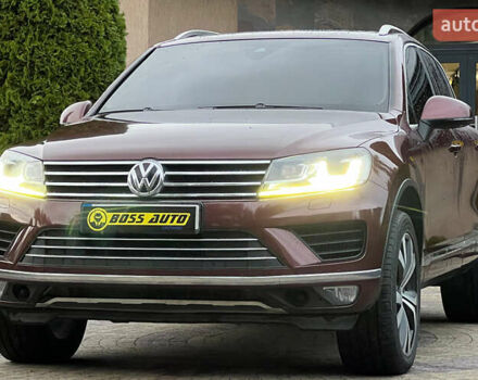 Красный Фольксваген Туарег, объемом двигателя 2.97 л и пробегом 191 тыс. км за 40500 $, фото 2 на Automoto.ua