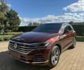 Красный Фольксваген Туарег, объемом двигателя 3 л и пробегом 40 тыс. км за 7800 $, фото 1 на Automoto.ua