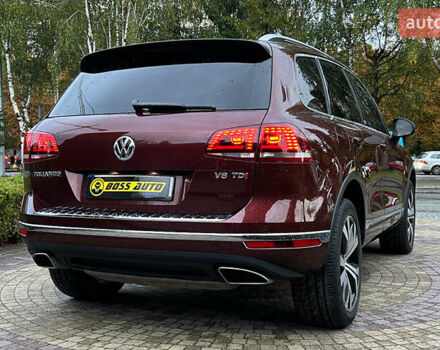 Красный Фольксваген Туарег, объемом двигателя 2.97 л и пробегом 191 тыс. км за 40500 $, фото 4 на Automoto.ua