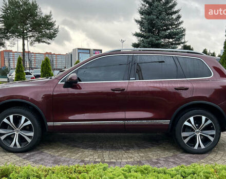 Красный Фольксваген Туарег, объемом двигателя 2.97 л и пробегом 191 тыс. км за 40500 $, фото 3 на Automoto.ua