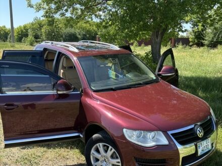 Фольксваген Туарег 2010 в Лубнах на Automoto.ua Красный Фольксваген Туарег, объемом двигателя 3 л и пробегом 300 тыс. км за 13500 $, фото 1 на Automoto.ua