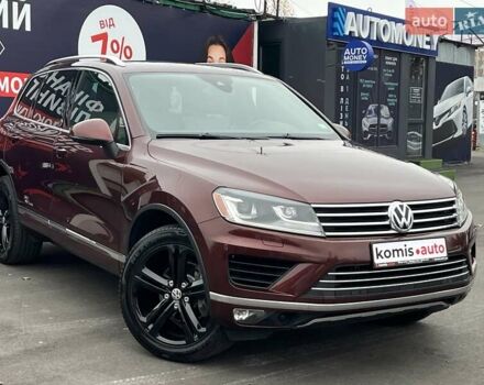 Красный Фольксваген Туарег, объемом двигателя 3.6 л и пробегом 189 тыс. км за 22649 $, фото 1 на Automoto.ua
