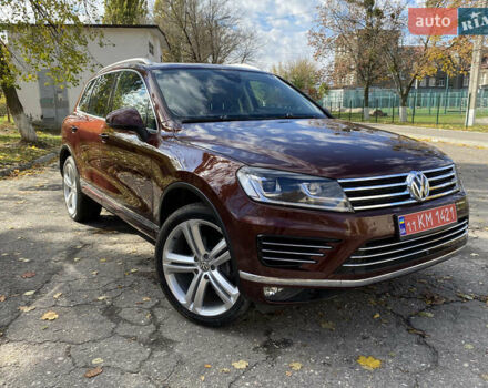 Красный Фольксваген Туарег, объемом двигателя 3.6 л и пробегом 127 тыс. км за 21500 $, фото 1 на Automoto.ua