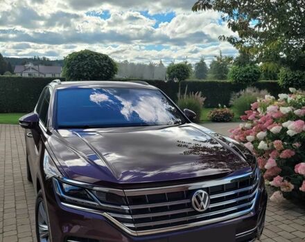 Красный Фольксваген Туарег, объемом двигателя 3 л и пробегом 40 тыс. км за 7800 $, фото 1 на Automoto.ua