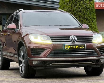 Красный Фольксваген Туарег, объемом двигателя 2.97 л и пробегом 191 тыс. км за 40500 $, фото 1 на Automoto.ua