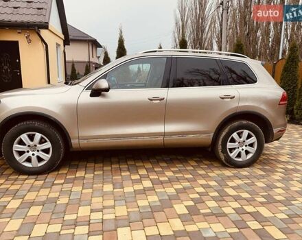 Желтый Фольксваген Туарег, объемом двигателя 3 л и пробегом 239 тыс. км за 32000 $, фото 3 на Automoto.ua