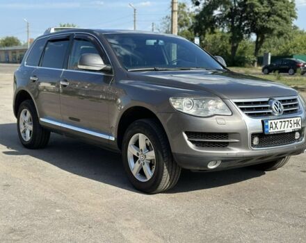 Серый Фольксваген Туарег, объемом двигателя 3 л и пробегом 230 тыс. км за 12500 $, фото 6 на Automoto.ua