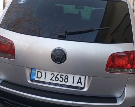 Серый Фольксваген Туарег, объемом двигателя 2.5 л и пробегом 260 тыс. км за 7600 $, фото 2 на Automoto.ua